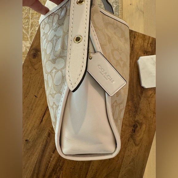 Coach Signature Duffelette Beige Canvas
Leather Trim Crossbody Bag 25697 NWOT - Picture 11 of 14